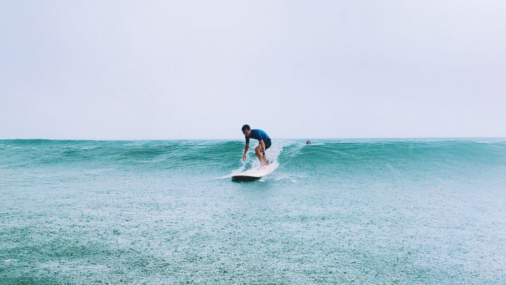 Visitors should have basic skills or join training sessions beforehand to ensure safety while surfing the waves